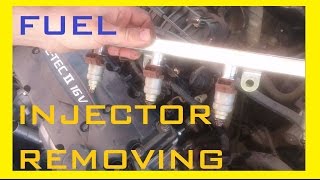 how to remove fuel injectors [upl. by Anuqahs]