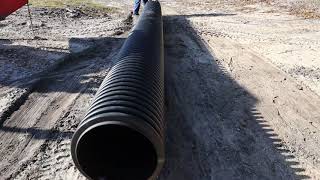 Installing a POND Spillway Overflow Pipe  Pond Build [upl. by Nylesor]