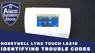 How To Clear Trouble Conditions On Honeywell Lynx L5210  AlarmSystemStore [upl. by Dianthe]