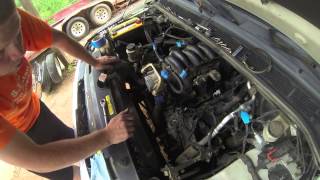 REPLACING NISSAN TITAN KNOCK SENSORS [upl. by Iidnarb]