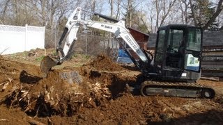 Bobcat E50 Removing Big 32quot Stump [upl. by Mira513]