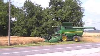 John Deere S680 and Case IH 8120 Combines Opening Their Grain Bins [upl. by Ellery985]