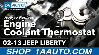 How To Replace Thermostat Housing 0213 Jeep Liberty [upl. by Auria]