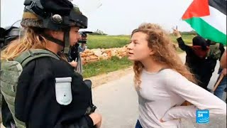 Who is Ahed Tamimi the Palestinian teen charged for slapping and kicking an Israeli soldier [upl. by Nomar]