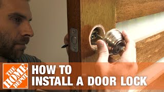 How to Install a Door Lock  The Home Depot [upl. by Lovell474]