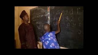 Teaching ODUDUWA ALPHABET in the Classroom at PortoNovo City [upl. by Giulia]