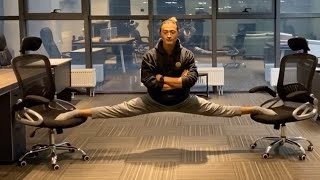 Gymnast Performs Impressive Splits On Office Chairs [upl. by Ila]