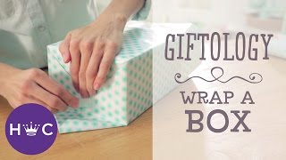 How to Wrap a Box  Giftology [upl. by Aynad]